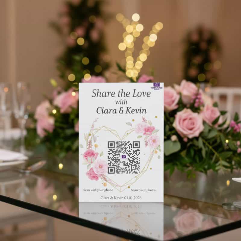 Heart floral wedding QR code cards displayed on reception table for photo collection